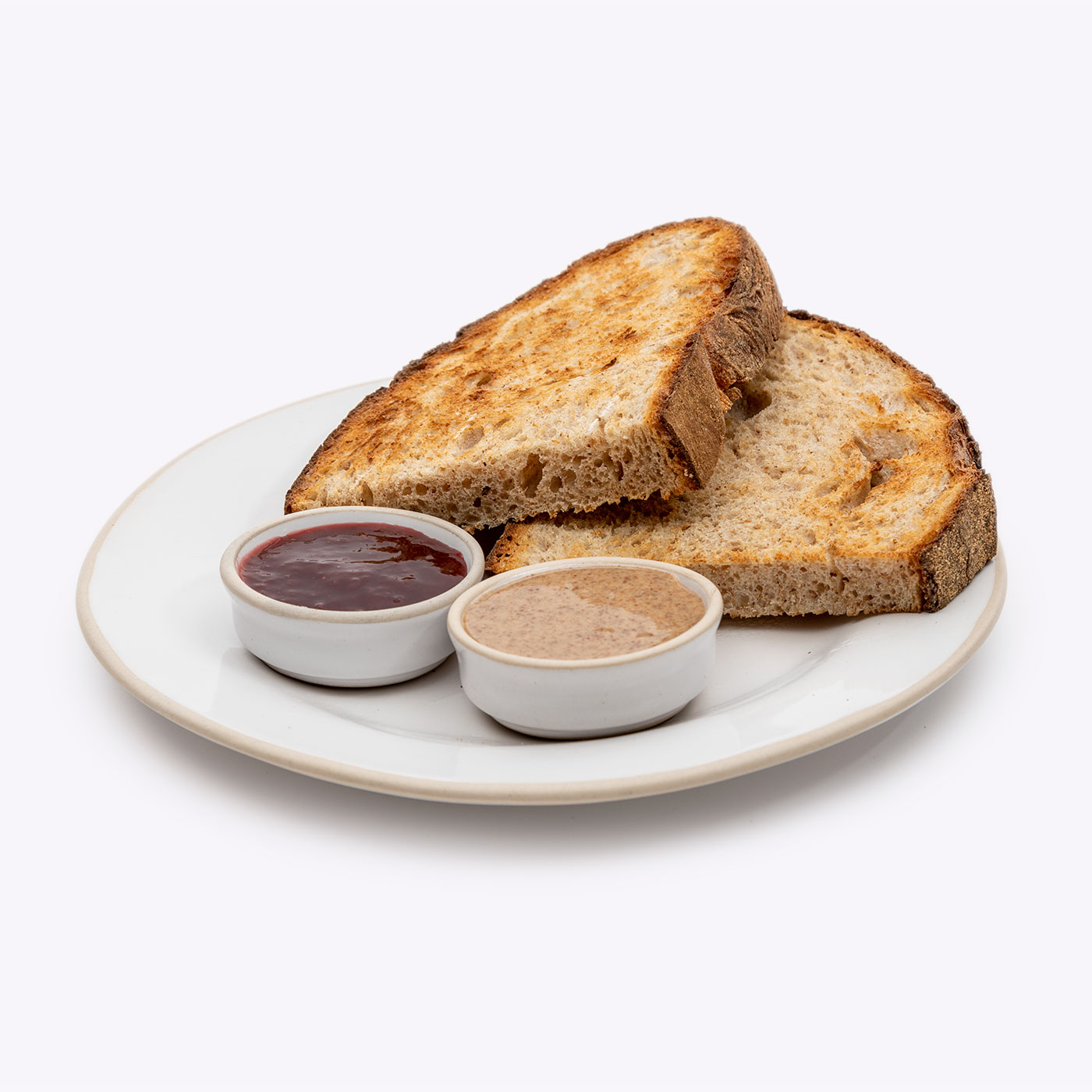 Dark Sourdough toast with Almond Butter & Strawberry Jam